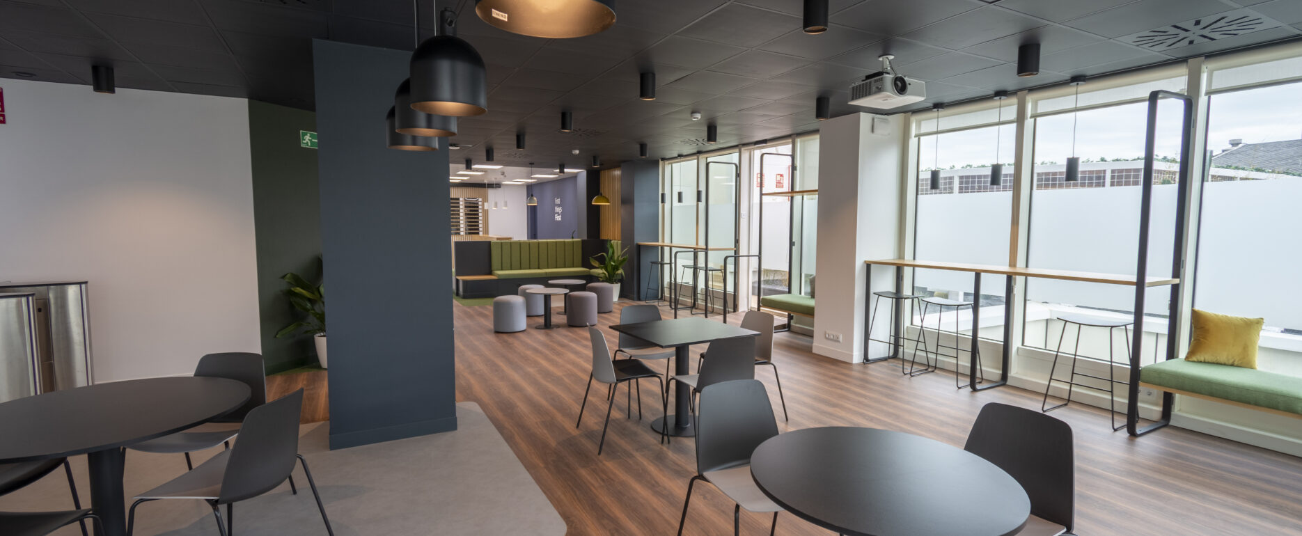 Company team working in a coworking space after making the leap to coworking