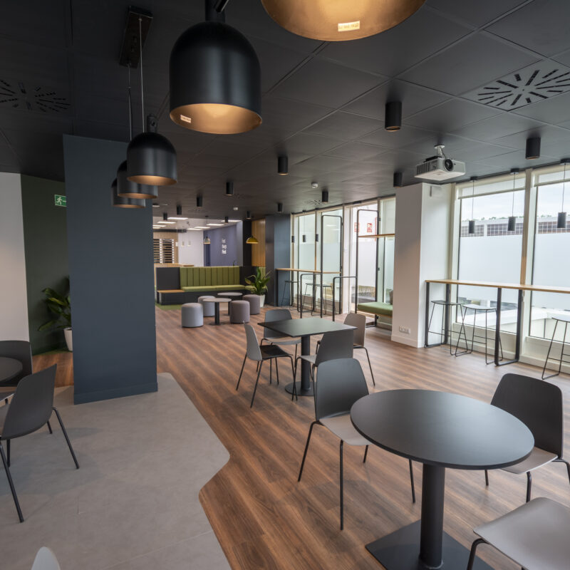 Company team working in a coworking space after making the leap to coworking